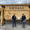 Jacob Castro and Matt Gonzalez hold the Progress
in “The Land of the Midnight Sun” as they prepare to
enter Denali National Park.
